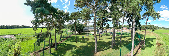 Panoramic view of the grounds, fields and secure play areas