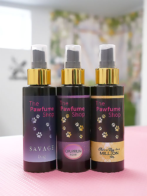 Three 'pawfume' bottles